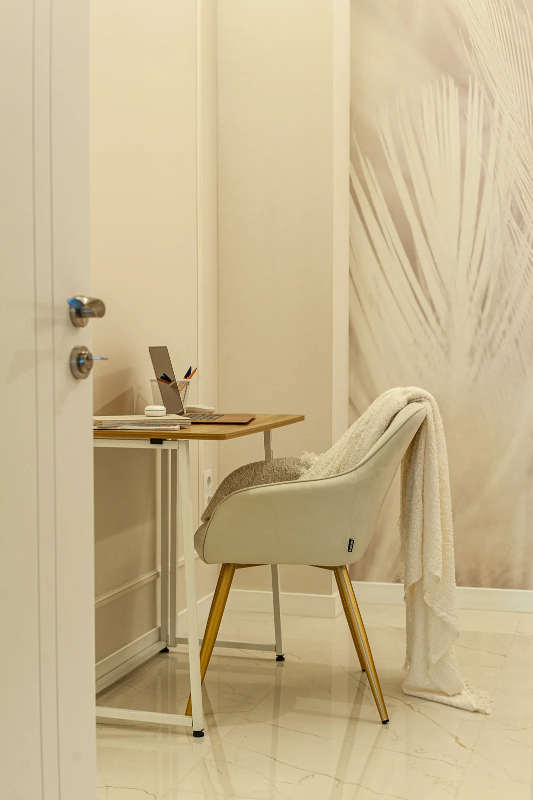 Desk by the palm wall